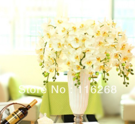 Белые искуственные орхидеи. Длинна изделия общая - 40-42 см. В партии 5 веток. Их стоимость 2500 руб.